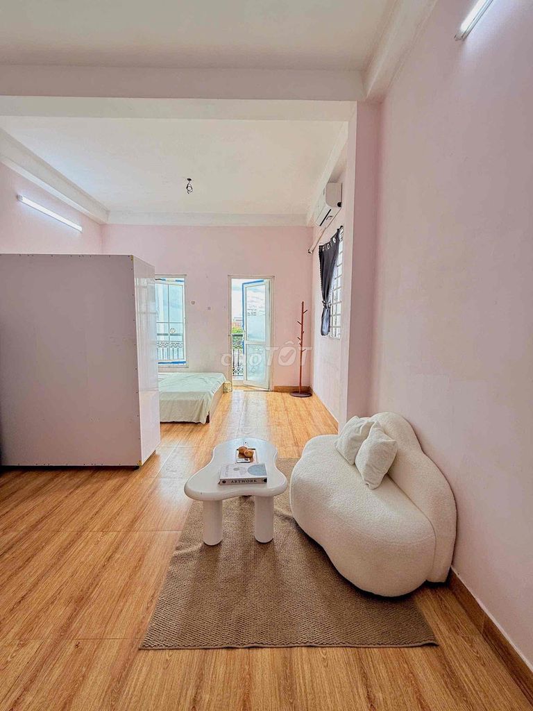 The balcony studio is full of furniture - private washing machine