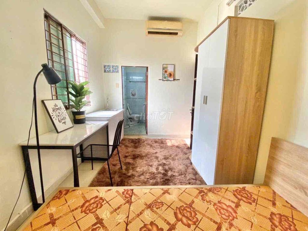 open window motel - full interior at Hoàng Hoa Thám market