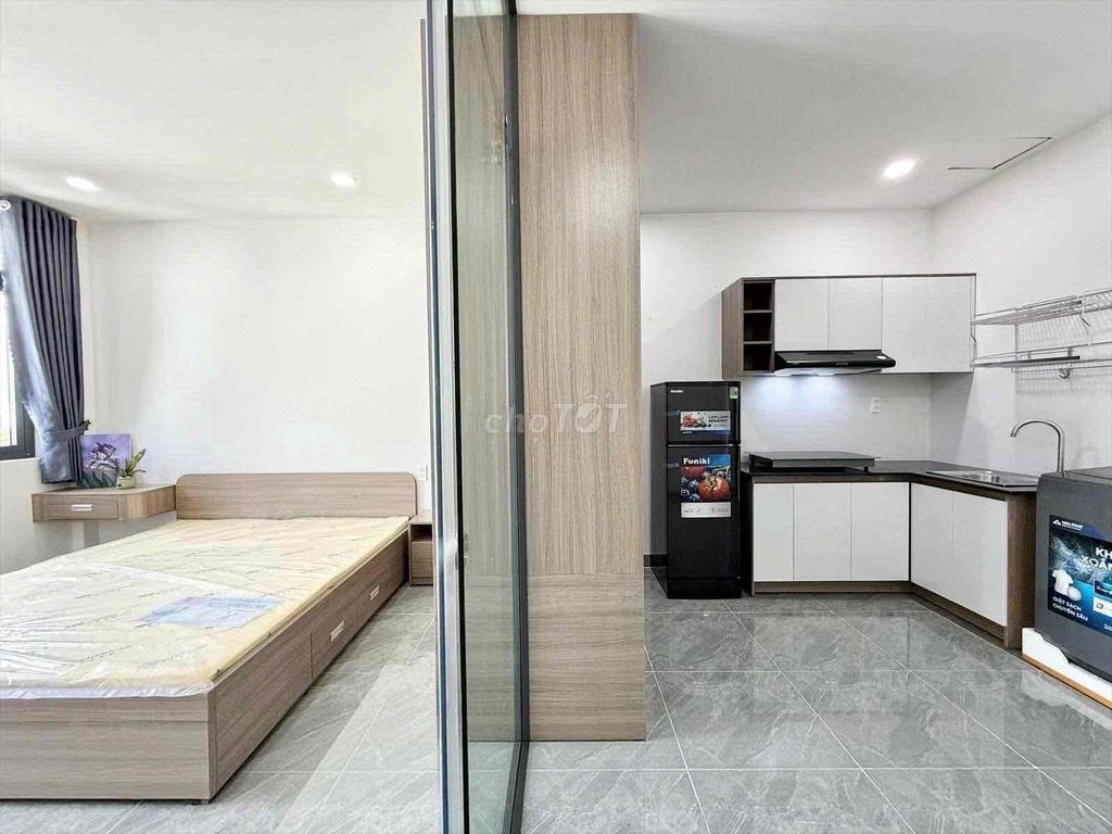 A bedroom-a full interior balcony.