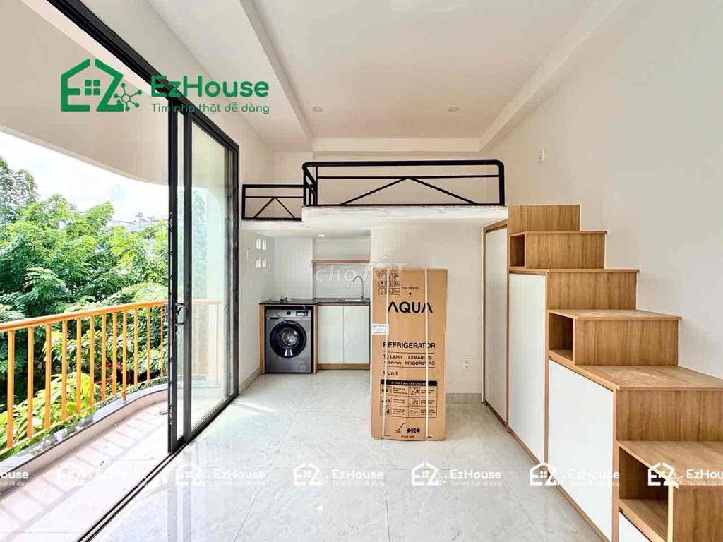 The balcony is full of furniture. It looks like Phạm Văn Bạch in the new room.