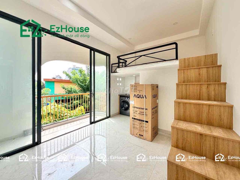 The balcony is full of furniture. It looks like Phạm Văn Bạch in the new room.