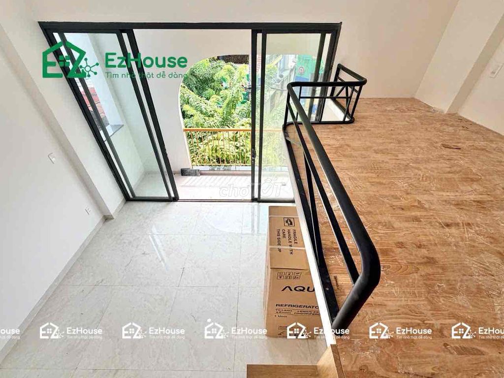 The balcony is full of furniture. It looks like Phạm Văn Bạch in the new room.