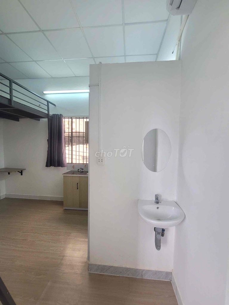 Room 2 Aron Tân Phú, ready air conditioning, kitchen cabinet, common washing machine.