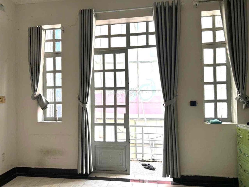The big room has a balconies.