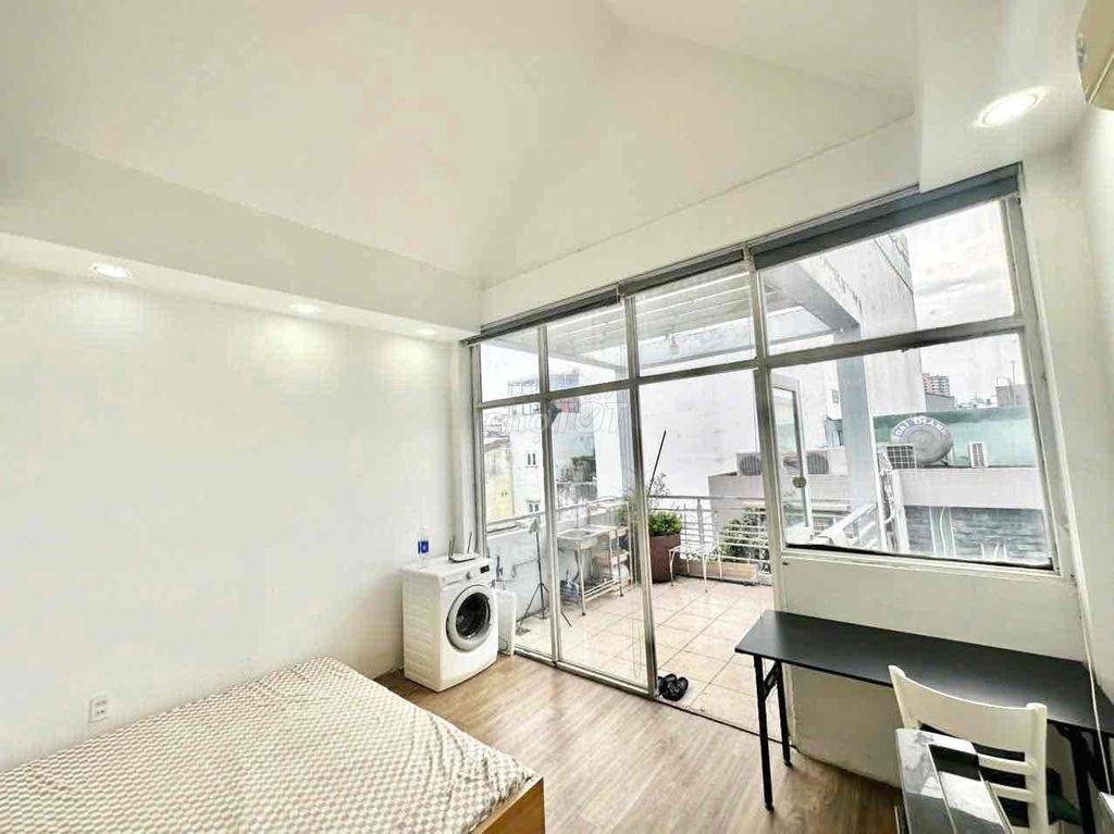 It's the owner of a 3rd floor balcony studio called Phú Nhuận