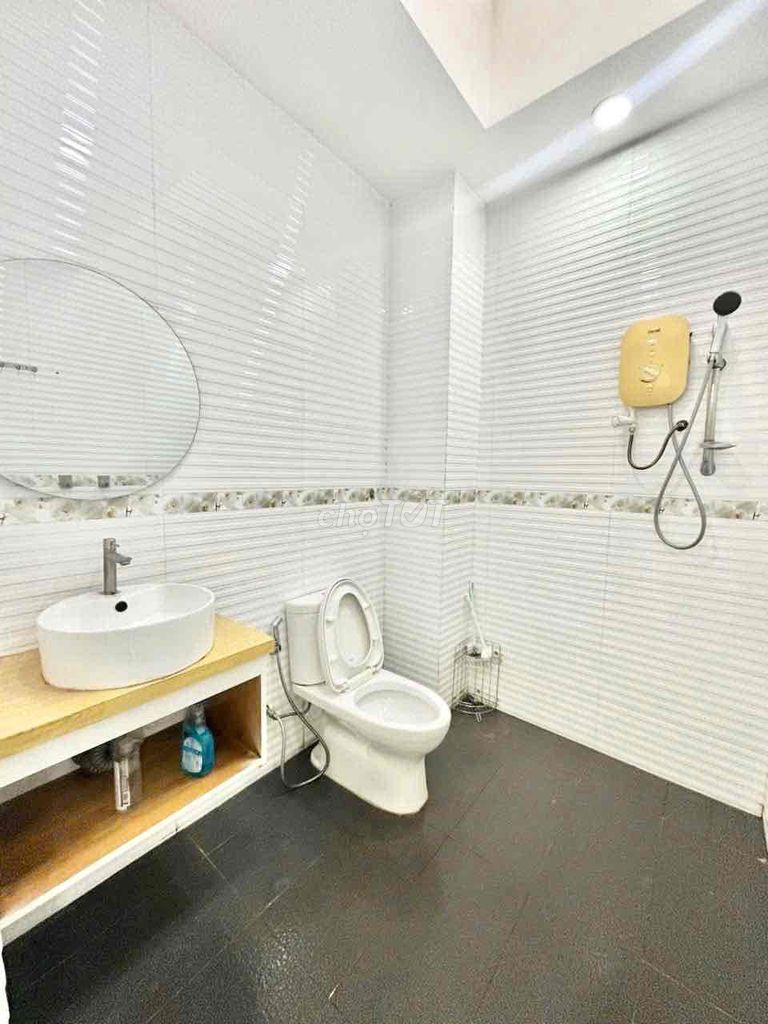 It's the owner of a 3rd floor balcony studio called Phú Nhuận
