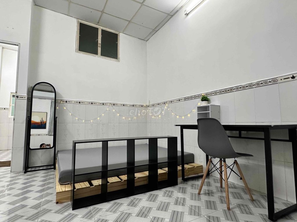 The entire second floor has a broad balcony with a roof.