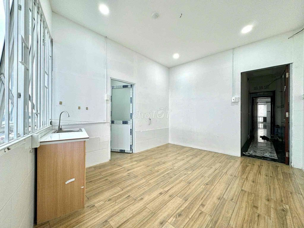 Rent a cheap room 50 yards from the gate.