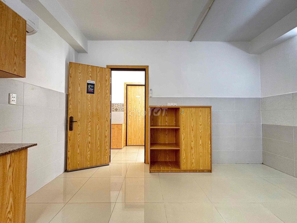 The studio near the department store is cheaply expensive full of furniture is empty