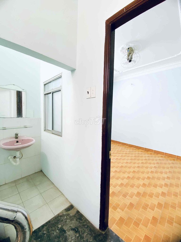There's an air conditioning with a window to the same bathroom.