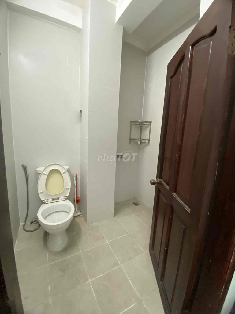 There's an air conditioning with a window to the same bathroom.