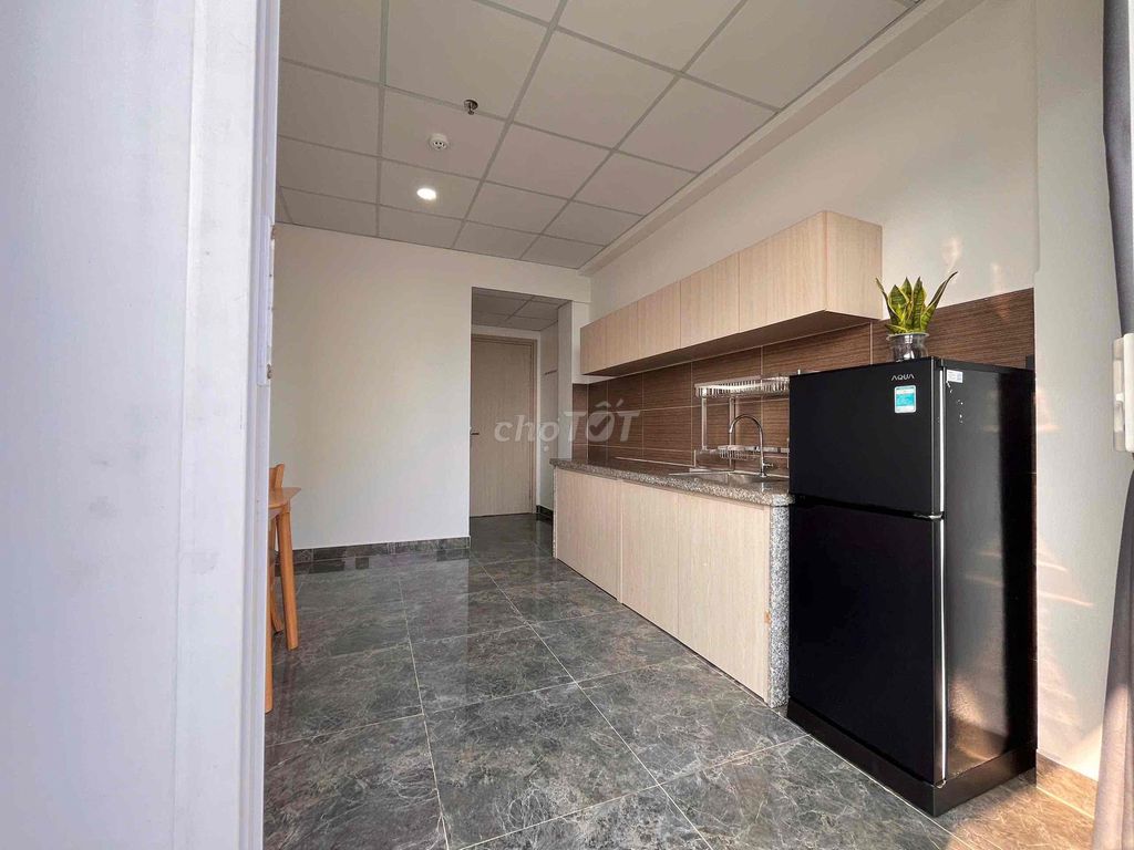 The apartment separates the kitchen. A super large bedroom.