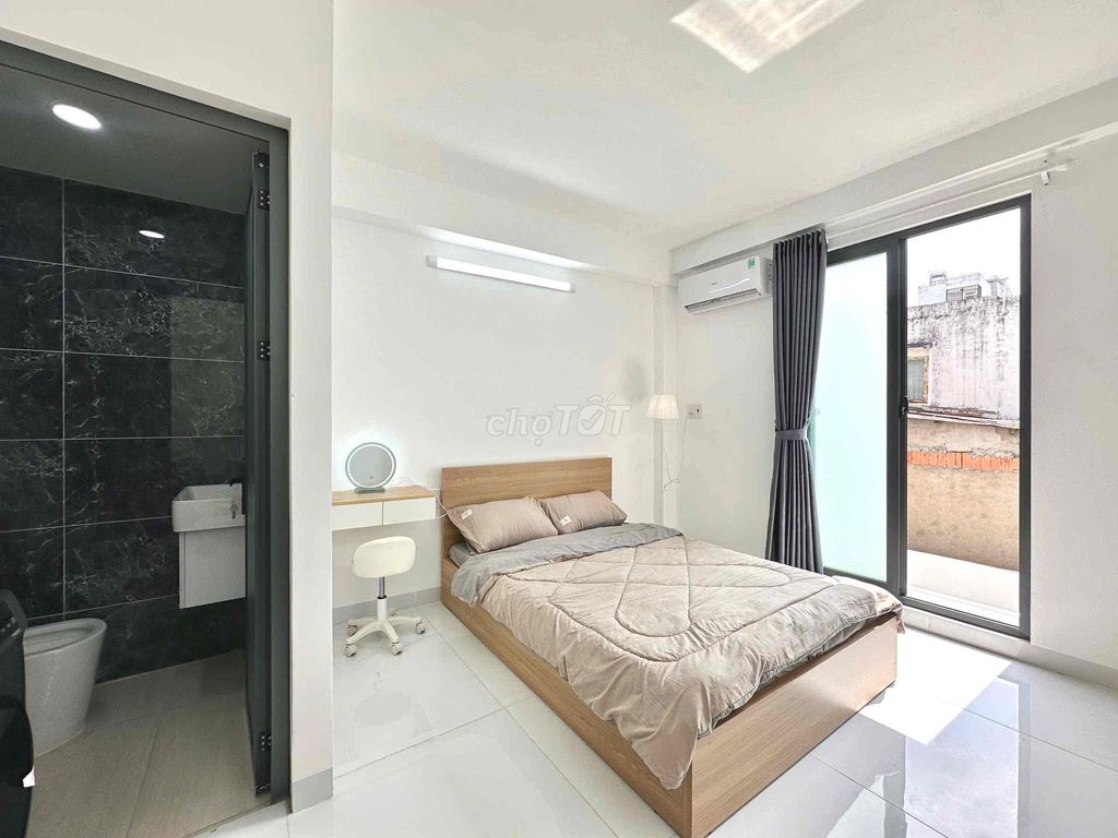 Clean balcony studio.