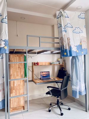 The dorm, 100 meters from the University of Café, District 12.