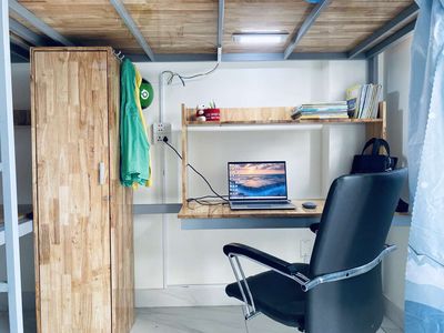 The dorm, 100 meters from the University of Café, District 12.
