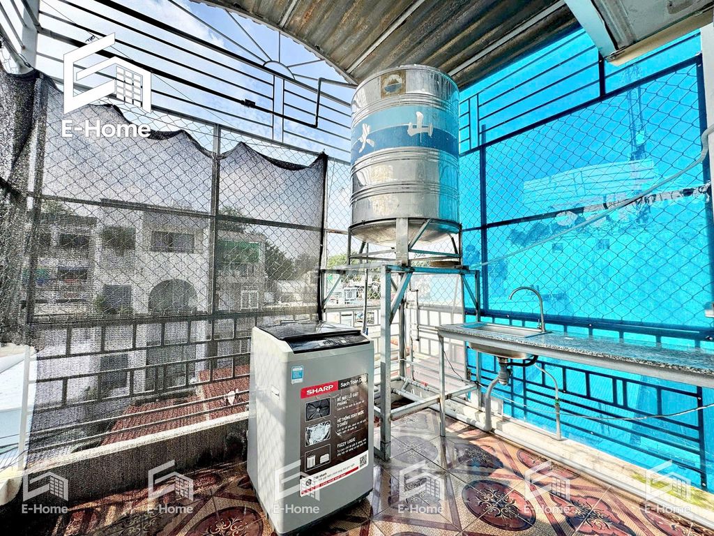 The studio is full of furniture - his own balcony - his own washing machine