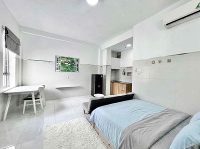 Renting mini apartments / elevator building - right on the wrong side of the block.