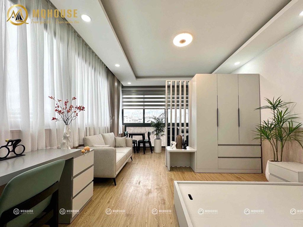 The apartment separates the super open window from the big street front.