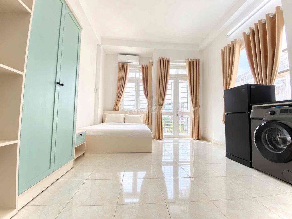 The balcony studio is full of balconies near the airport.