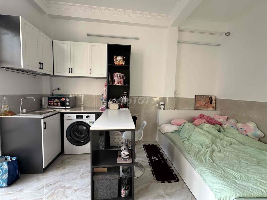 The studio apartment, the balcony.