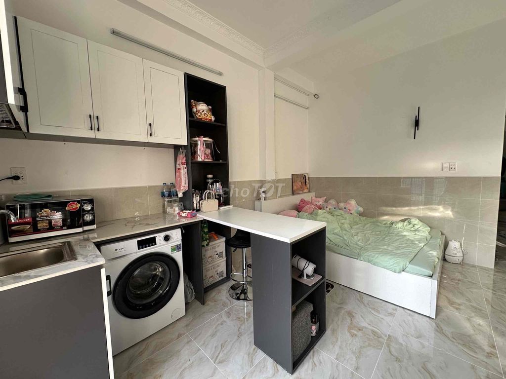 The studio apartment, the balcony.