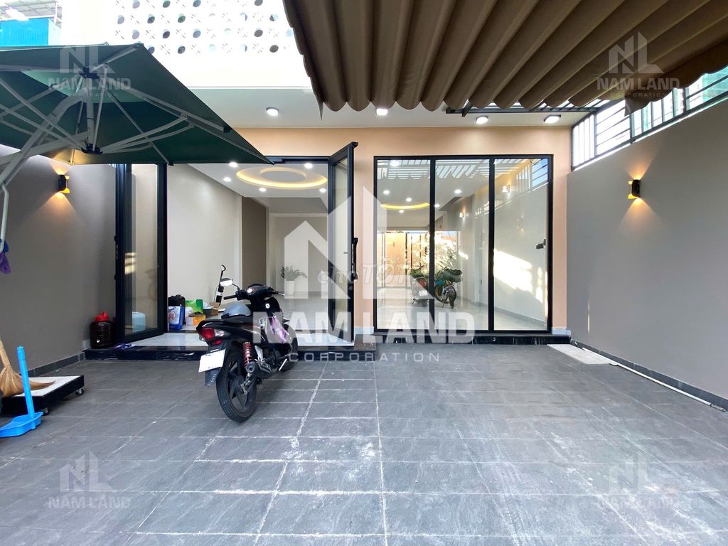 It's a super cool new house. Three-story garage. Five-room big office.
