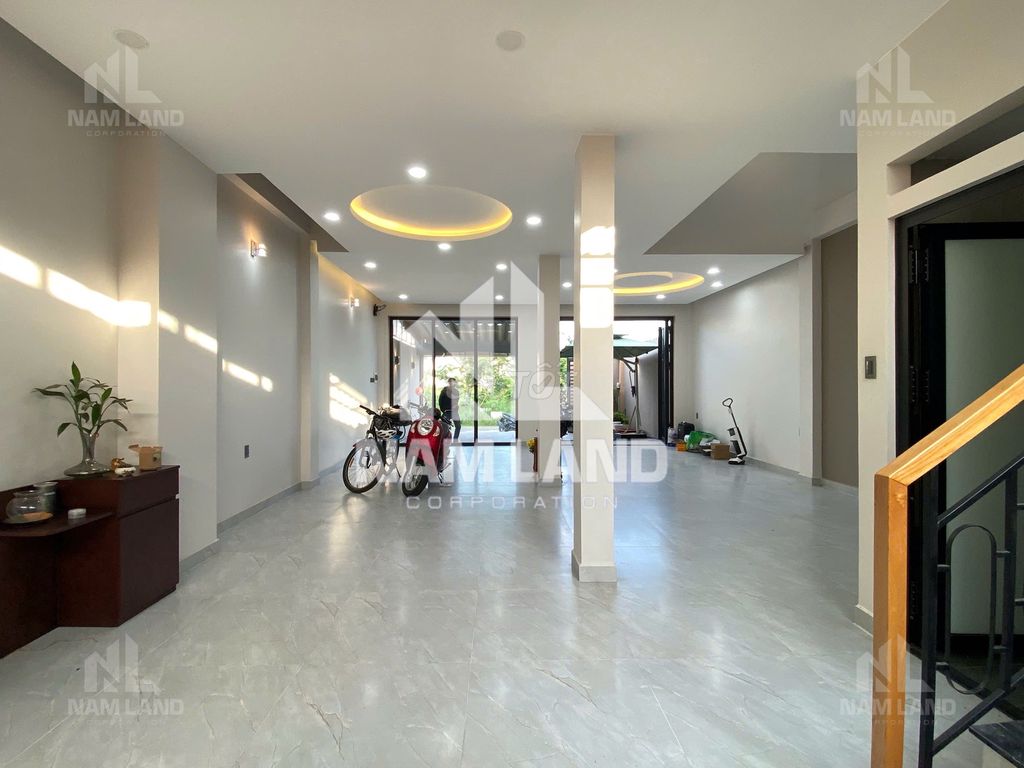 It's a super cool new house. Three-story garage. Five-room big office.