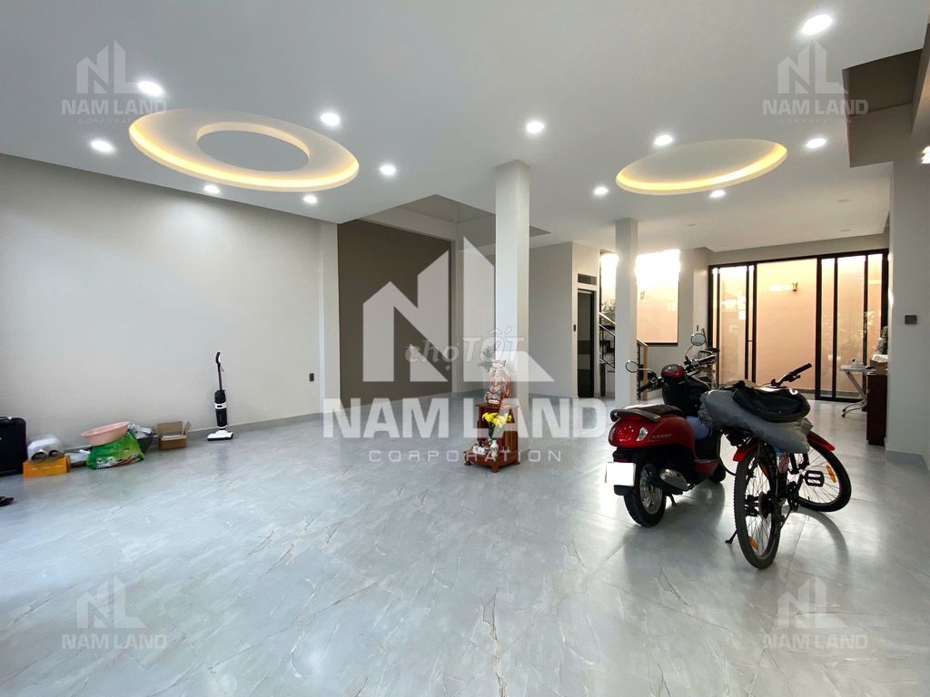 It's a super cool new house. Three-story garage. Five-room big office.