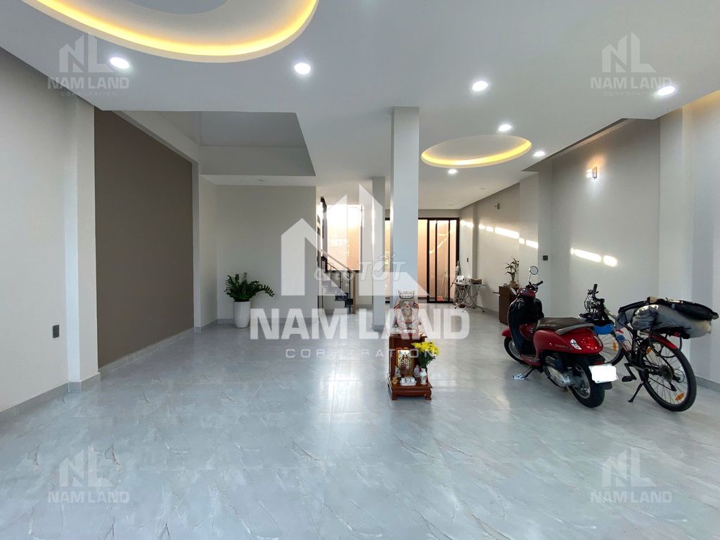 It's a super cool new house. Three-story garage. Five-room big office.