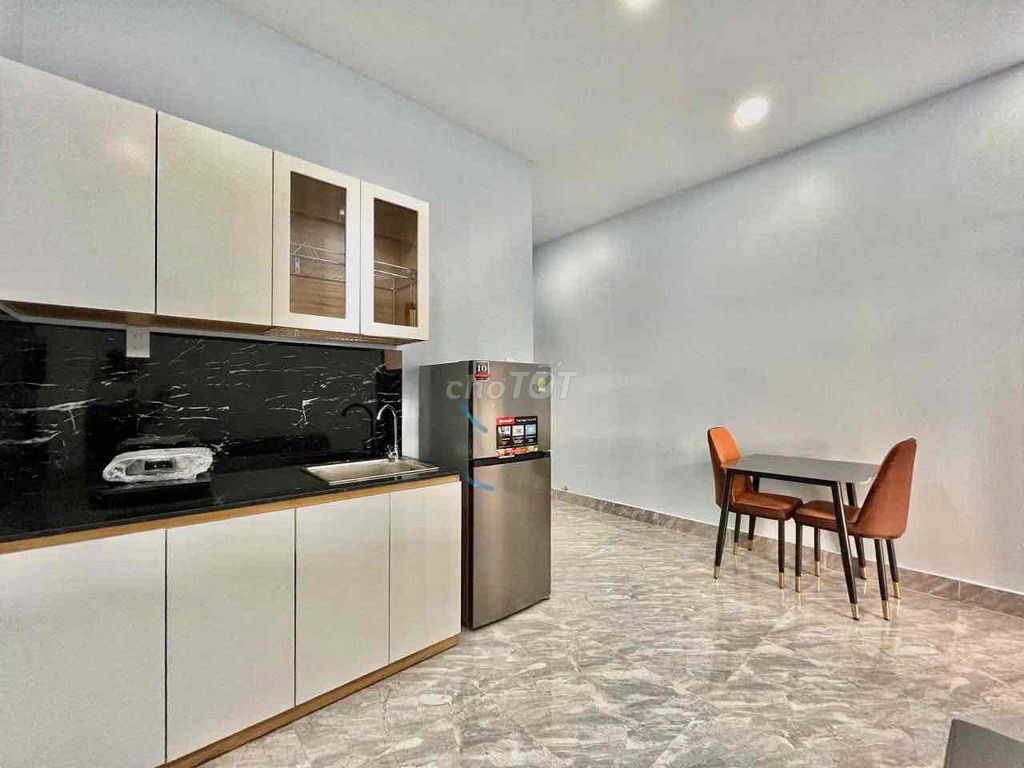 The service system is one bedroom, full of furniture - with elevators.