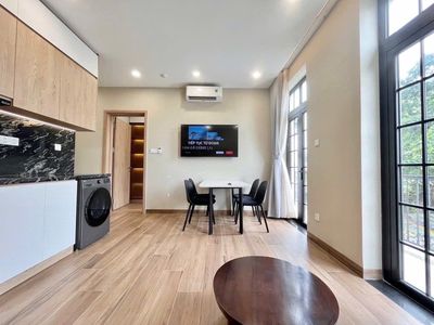 Rent a high-end service apartment -- lots of light -- modern design.