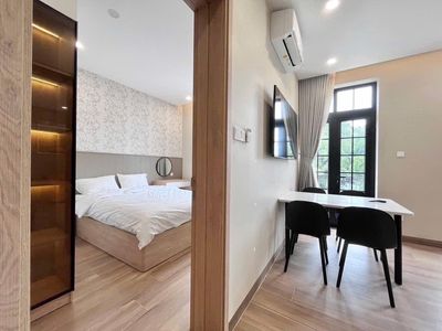 Rent a high-end service apartment -- lots of light -- modern design.
