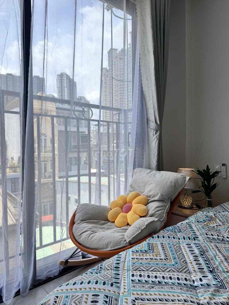 The mini apartment has a beautiful interior balcony elevator in Saigon.