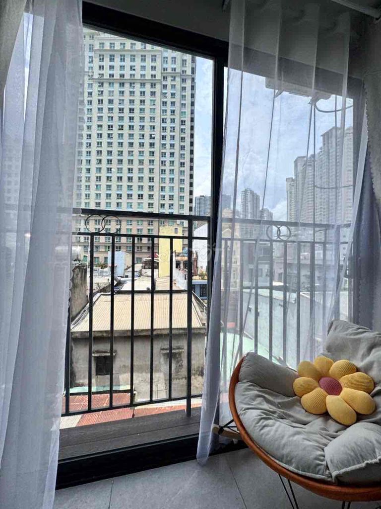The mini apartment has a beautiful interior balcony elevator in Saigon.