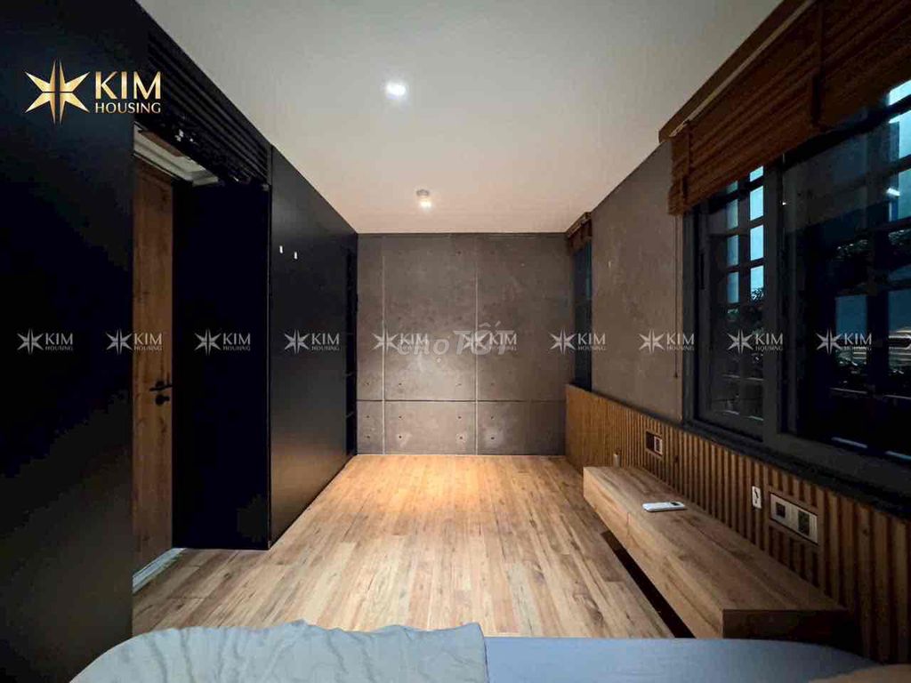 A hot tone bedroom - a large living room - a fancy pool