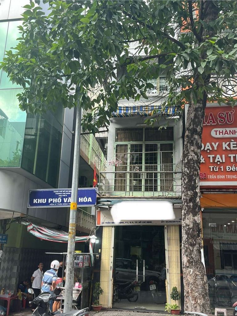 In front of the house, we have 29 Trần Bình Trọng (1970). 1 District 5.