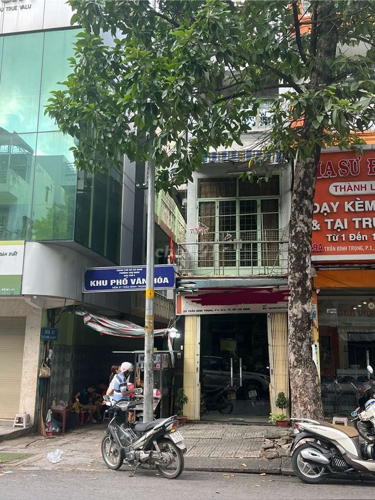 In front of the house, we have 29 Trần Bình Trọng (1970). 1 District 5.