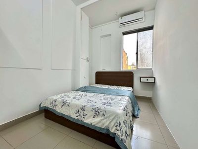 Two bedrooms full of empty window interiors near a soft bridge