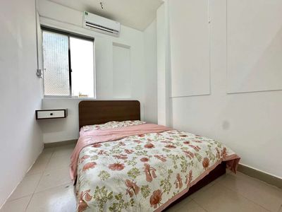 Two bedrooms full of empty window interiors near a soft bridge
