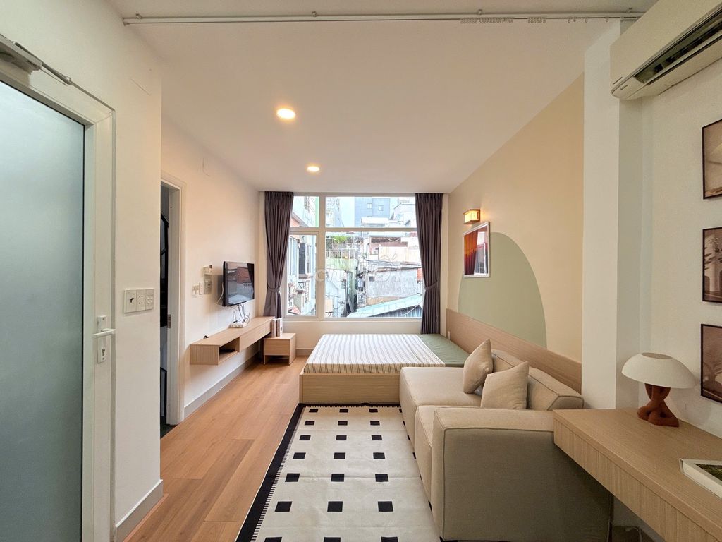 A studio room - full interior - window - in a democratic cycle