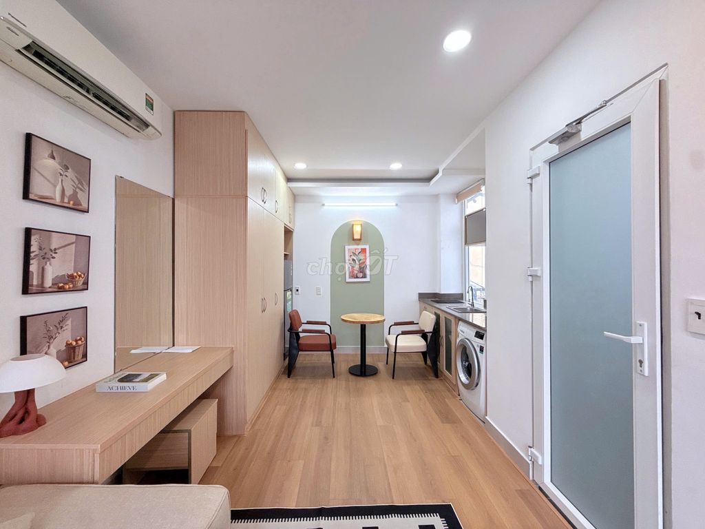 A studio room - full interior - window - in a democratic cycle