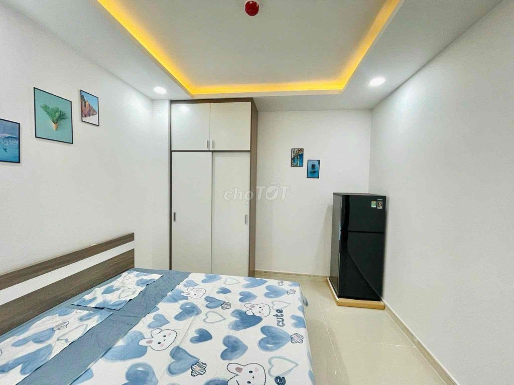 The studio apartment is full of furniture with a security elevator on the CV.