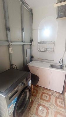We'll rent two bedrooms, and we'll have the washing machine alone at Bình Thạnh.