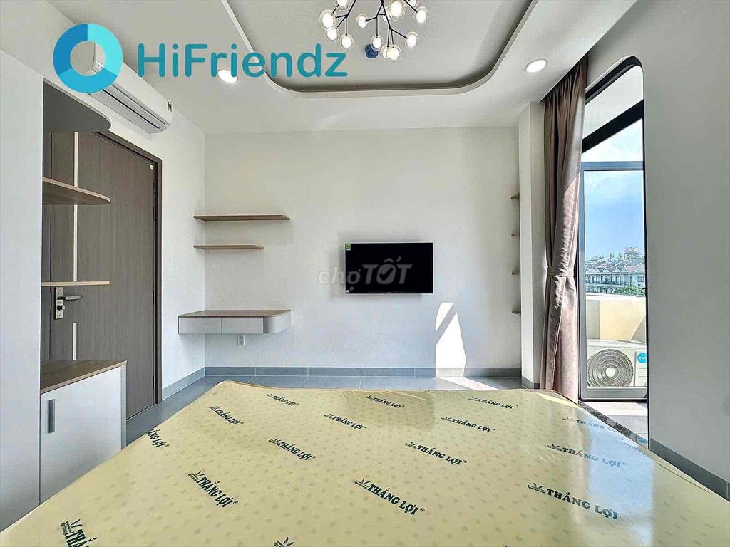 A full bedroom. A wide kitchen.