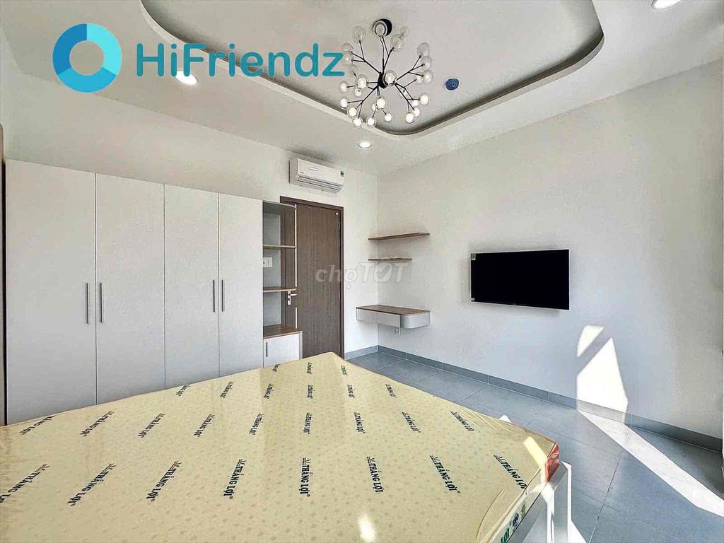 A full bedroom. A wide kitchen.