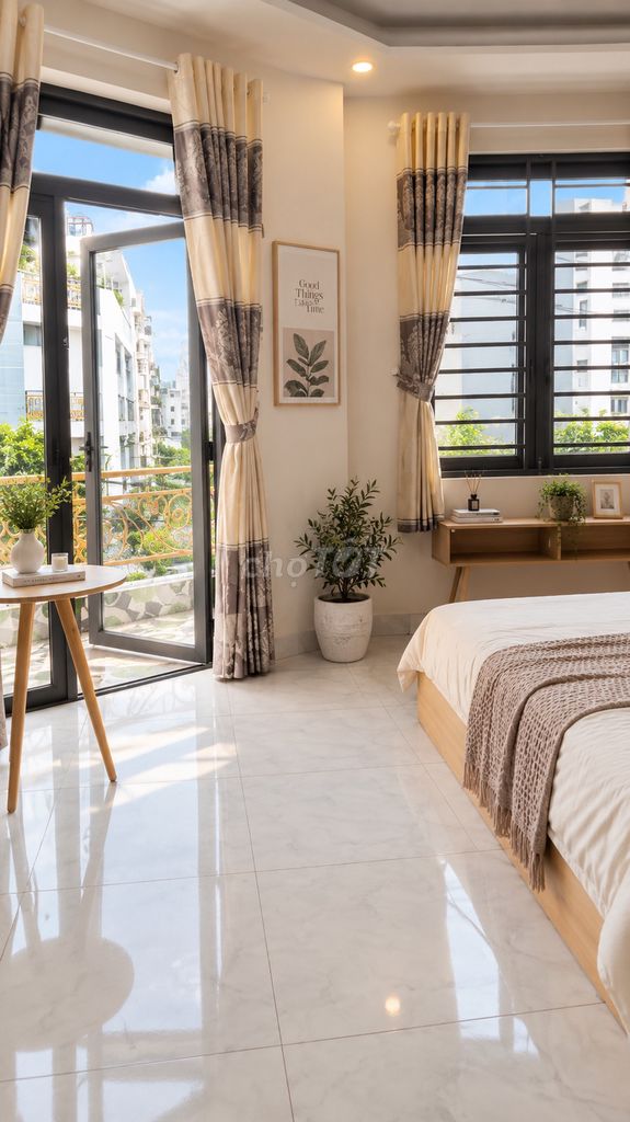 The Bình Tân studio does not have a full block of furniture near the shower bow.