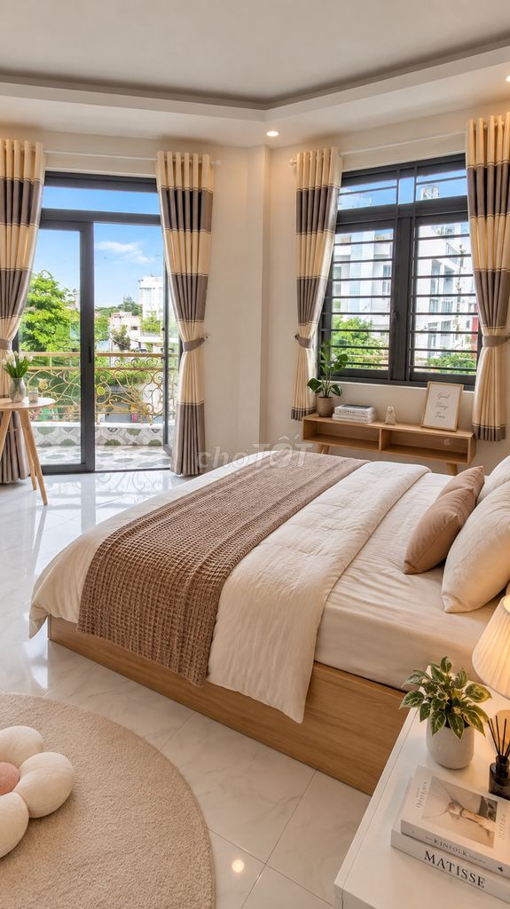 The Bình Tân studio does not have a full block of furniture near the shower bow.