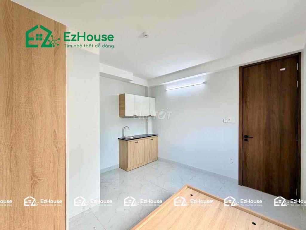 A new studio full of furniture, open sky windows
