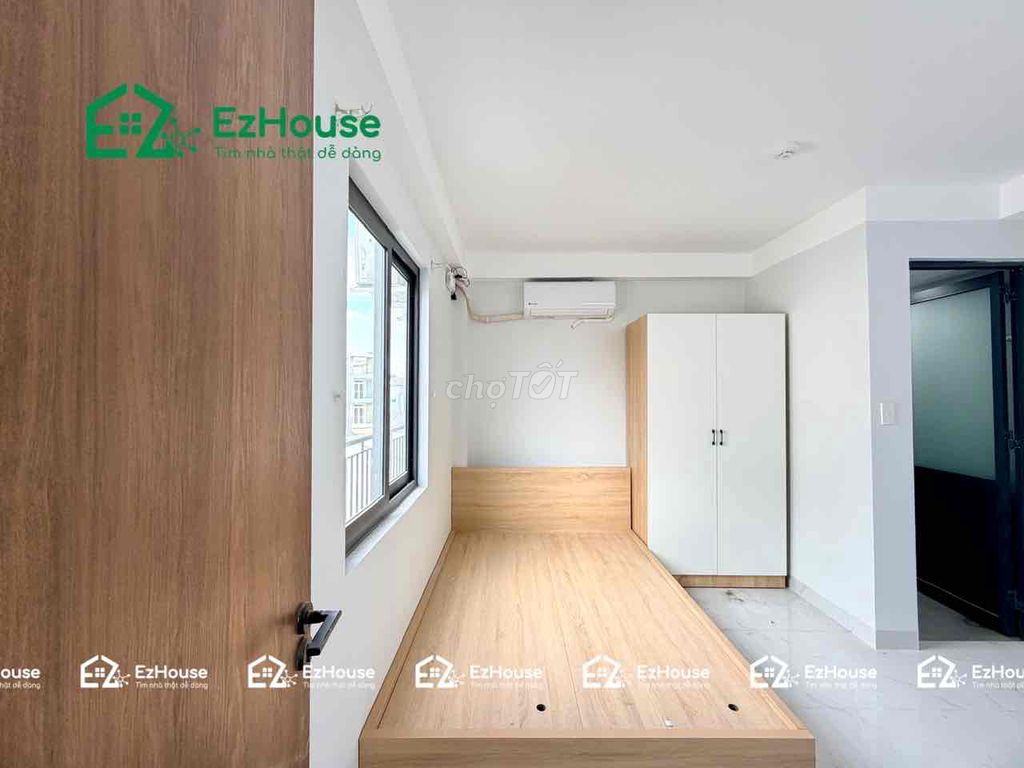 A new studio full of furniture, open sky windows