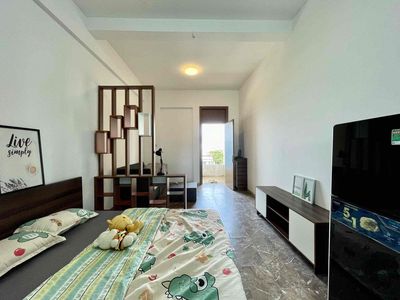 1 Full bedroom with a washing machine for pet pet